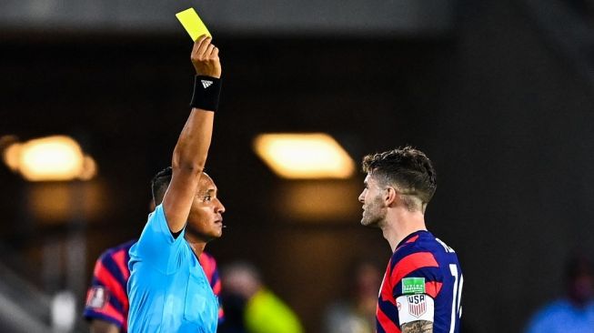 Penyerang sayap sekaligus kapten Timnas Amerika Serikat, Christian Pulisic (kanan). [CHANDAN KHANNA / AFP]