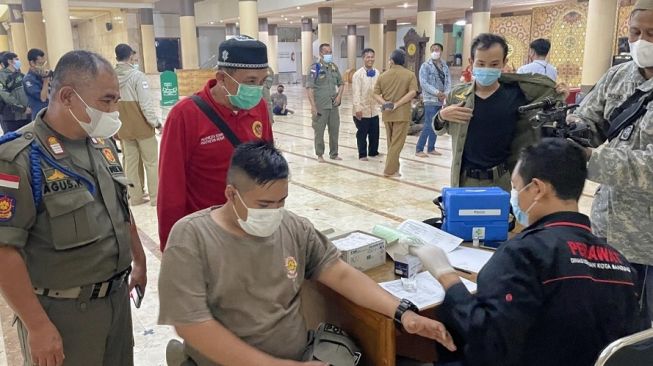 Tarik Minat Masyarakat, Binda Gorontalo Galakkan Vaksinasi Malam Hari