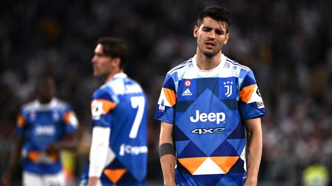 Reaksi penyerang Juventus Alvaro Morata selama pertandingan sepak bola Serie A Italia antara Juventus melawan Bologna pada 16 April 2022 di di Allianz Stadium pada Minggu (17/4/2022) dini hari WIB.
MARCO BERTORELLO / AFP