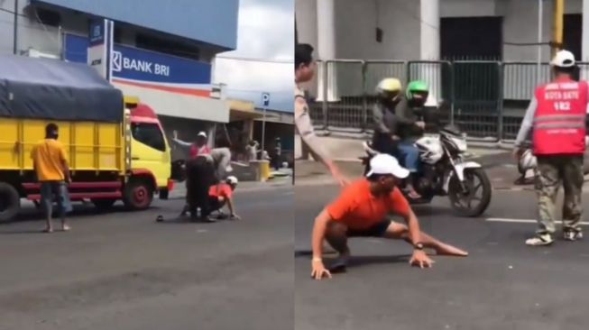 Bapak-bapak Berpose Bak Spiderman di Tengah Jalan saat Dirazia Polisi, Warganet: Peter Parkir