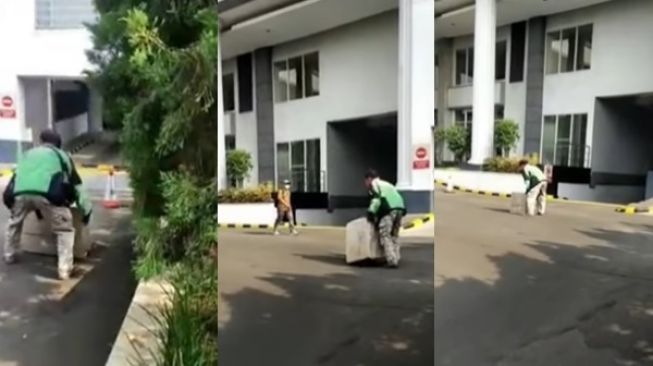 Viral Driver Ojol Jalan Angkut Kardus Berat Pesanan Pelanggan di Perkantoran (instagram/@terangmedia)