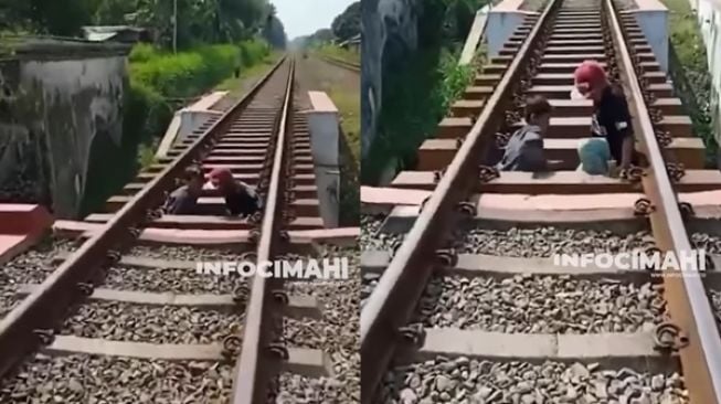 Duh! Bocah Tepergok Warga Masuk Kolong Rel saat Kereta Api Melintas (instagram/infocimahi.co)