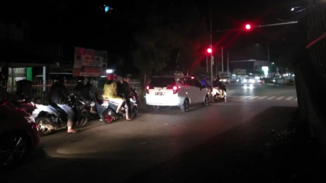 Toa Lampu Merah Simpang 5 Stienas Banjarmasin Bersuara Musik DJ dan Gonggongan Anjing