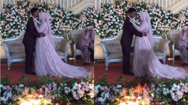 Lagi Cium Mempelai Perempuan, Momen Romantis Pengantin Rusak Gegara Bunga Pelaminan Terbakar, Publik: Kecupan Berapi-Api