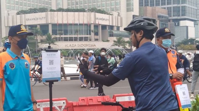 Warga Jakarta Wajib Memindai QR Code PeduliLindungi di Kawasan Car Free Day