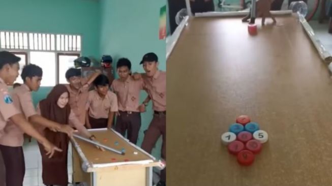 Kreatif, Siswa Ini Bermain Biliar Pakai Peralatan Sederhana yang Ada di Kelas!