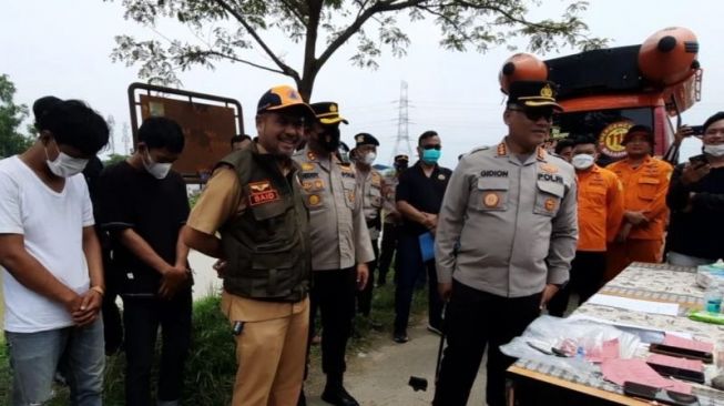 Polisi membongkar aksi Wahyu Suhada mengarang cerita tewas tenggelam di Kalimalang Bekasi demi dapat klaim asuransi miliaran rupiah. (Antara)