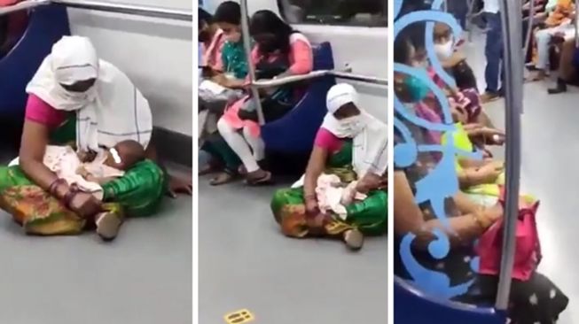 Wanita duduk di lantai KRL sambil gendong anaknya karena tidak dapat kursi prioritas. (Twitter/@AwanishSharan)