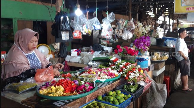Padagang Pasar Cinde Palembang Sumatera Selatan [Suara.com/Fadli]