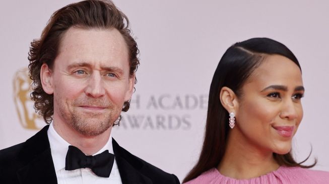 Tom Hiddleston dan Zawe Ashton [Tolga Akmen / AFP ]