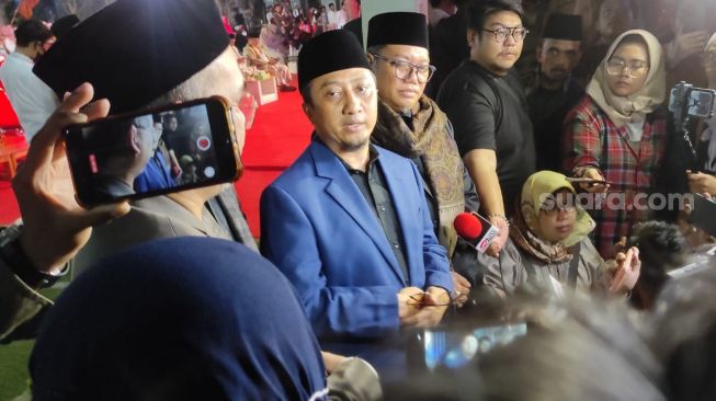 Ustaz Yusuf Mansur ditemui di acara Wisuda Akbar Tahfizh Quran di Pesantren Tahfizh Daarul Quran, di kawasan Cipondoh, Kota Tangerang, Sabtu (2/7/2022) malam. [Ferry Noviandi/Suara.com]