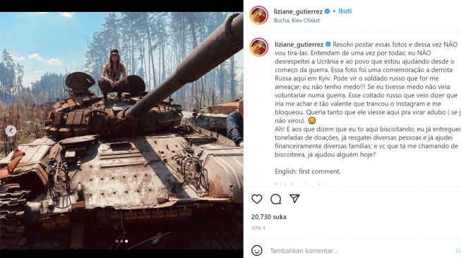 Viral seorang wanita asal Brazil yang mendapatkan ancaman karena membagikan foto di atas tank Rusia yang rusak (Instagram/liziane_gutierrez)