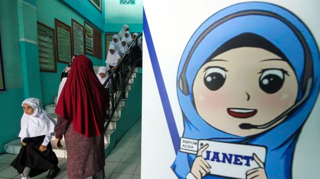 Sejumlah siswa baru kelas satu sekolah dasar mengikuti perkenalan lingkungan pada hari pertama masuk sekolah di SDN-1 Lhokseumawe, Aceh, Jumat (15/7/2022).  ANTARA FOTO/Rahmad