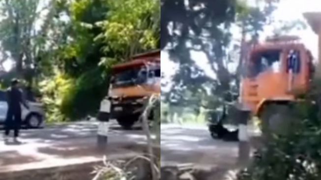 Tidak Untuk Ditiru, Aksi Pria Adang Truk, Diduga Sampai Sempat Terlindas Ban