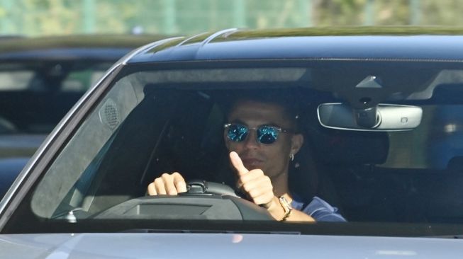 Cristiano Ronaldo, tiba untuk menghadiri sesi latihan di tempat latihan Manchester United di Carrington, Inggris pada 8 September 2021.Paul ELLIS / AFP.