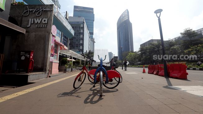 Suasana di Kawasan Sudirman, Dukuh Atas, Jakarta, Jumat (29/7).  [Suara.com/Oke Atmaja]