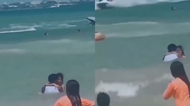 Beredar Video Pria dan Wanita Diduga Sepasang Kekasih Lakukan Aksi Tak Senonoh saat Berendam di Pantai