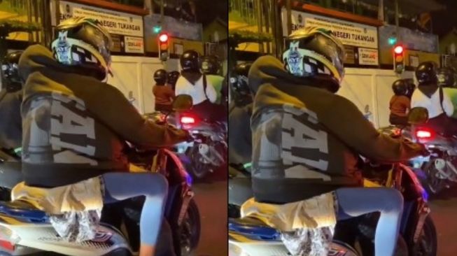 Sejoli Pakai Satu Jaket Berdua Saat Naik Sepeda Motor, Warganet: Kalau Jatuh Sehidup Semati