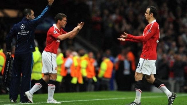 Pemain Manchester United Michael Owen menggantikan Berbatov dalam pertandingan Liga Champions kontra Schalke pada 4 Mei 2011. [AFP]