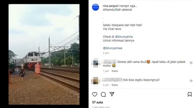 Emak-emak hampir disambar kereta api karena nekat berdiri terlalu dekat dengan rel. (Instagram/@rina.senjaa1)