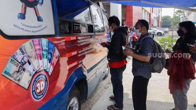 Siapkan Uang Tunai Rp31,6 Triliun, Begini Cara Penukaran Uang Pecahan Kecil di Bank Mandiri