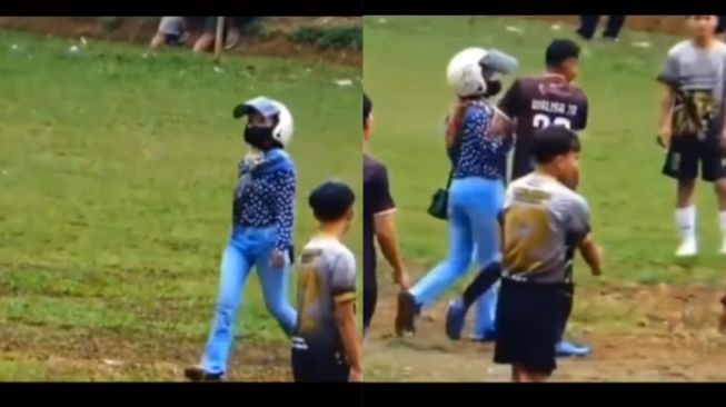 Seorang Wanita Masuk Lapangan, Jemput Sang Pacar yang Tengah Asik Bermain Bola, Netizen: Gue Sih Malu