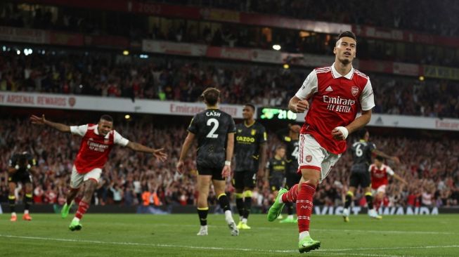 Gelandang Arsenal asal Brasil Gabriel Martinelli melakukan selebrasi usai mencetak gol kedua timnya selama pertandingan pekan kelima Liga Inggris 2022/2023 antara Arsenal vs Aston Villa di Stadion Emirates di London pada 31 Agustus 2022.ADRIAN DENNIS / AFP