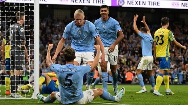 Striker Manchester City Erling Haaland merayakan golnya ke gawang Nottingham Forest dalam laga Liga Premier Inggris yang digelar di Stadion Etihad pada 1 September 2022. [AFP]