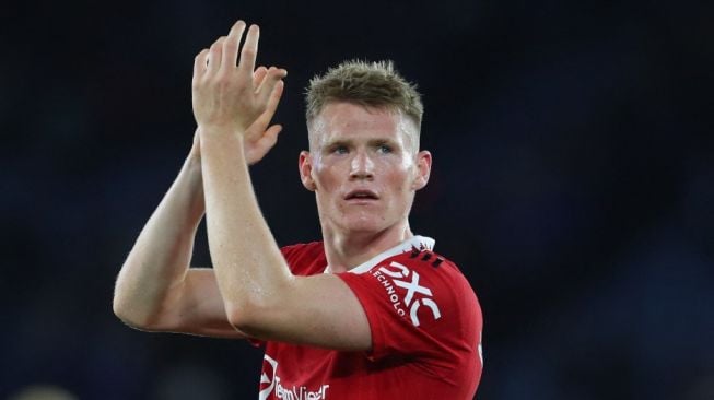 Gelandang sentral Manchester United, Scott McTominay. [GEOFF CADDICK / AFP]