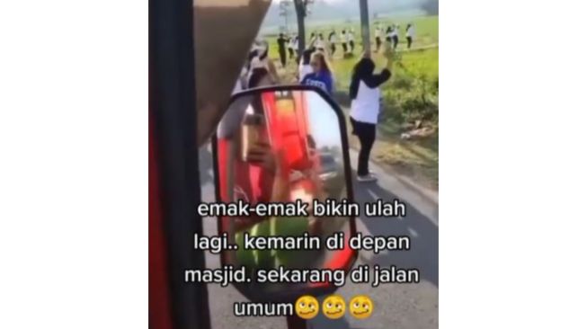 Asyik Senam di Tengah Jalan, Emak-Emak Ras Terkuat Bikin Sopir Truk Harus Ngalah