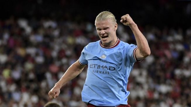Erling Haaland celebrates after scoring for Manchester City in their Champions League Group G match against Sevilla on September 7, 2022. ANTARA/AFP/CRISTINA QUICLER.