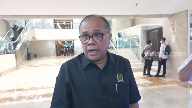 Anggota DPR RI fraksi PDIP, Junimart Girsang. (Suara.com/Bagaskara)