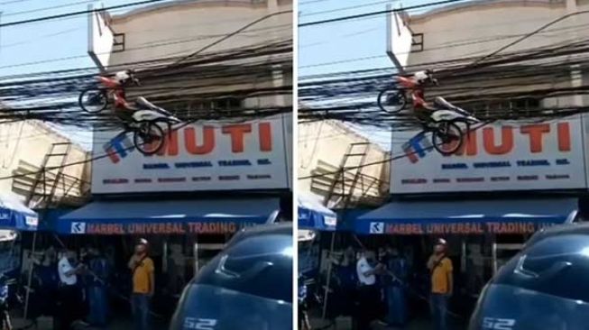 Motor 'Terbang' Tersangkut di Kabel Listrik, Netizen: Punya Kepak Sayap...