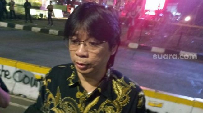 Tenaga Ahli Kantor Staf Kepresidenan (KSP) Johanes Joko ditemui di kawasan Patung Kuda, Jakarta Pusat, Selasa (13/9/2022) malam. [Suara.com/Yaumal Asri Adi Hutasuhut]