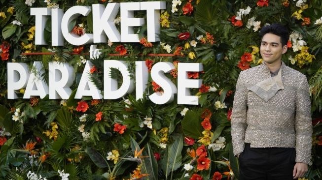 Maxime Bouttier saat menghadiri acara gala premier film Ticket To Paradise di London pada 7 September 2022. [Niklas Halle'n/AFP]