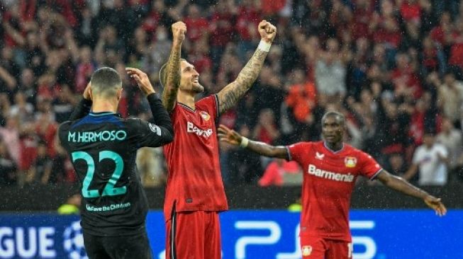 Atletico Madrid kalah dari Bayer Leverkusen dalam matchday kedua Grup B Liga Champions di BavArena, Selasa waktu setempat (Rabu dini hari WIB). Atletico Madrid menderita kekalahan 0-2. (AFP)