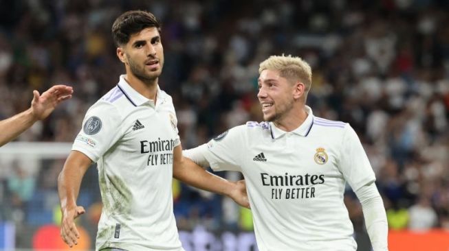 Selebrasi Marco Asensio (kiri) usai mencetak gol untuk Real Madrid ke gawang RB Leipzig dalam pertandingan Grup F Liga Champions pada 15 September 2022. ANTARA/AFP/THOMAS COEX