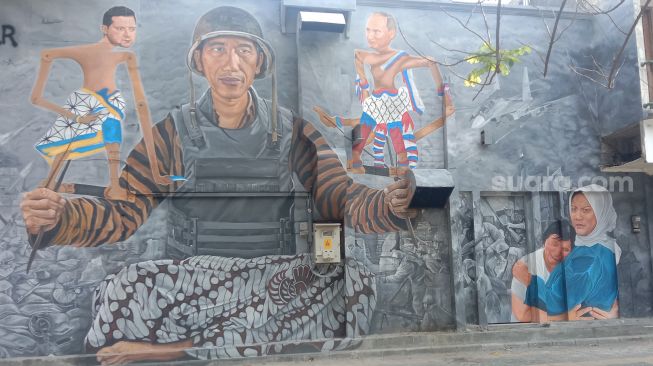 Heboh Mural Presiden Jokowi Jadi Dalang Bawa Wayang Berwajah Vladimir Putin dan Volodymyr Zelensky