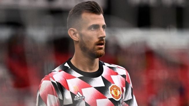 Kiper Manchester United, Martin Dubravka. [OLI SCARFF / AFP]