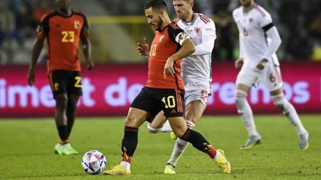 Tuan rumah langsung unggul dua gol di babak pertama berkat Kevid de Bruyne dan Mitchy Batshuayi, Wales hanya bisa mencetak satu gol melalui usaha Kieffer Moore di babak kedua. (AFP)