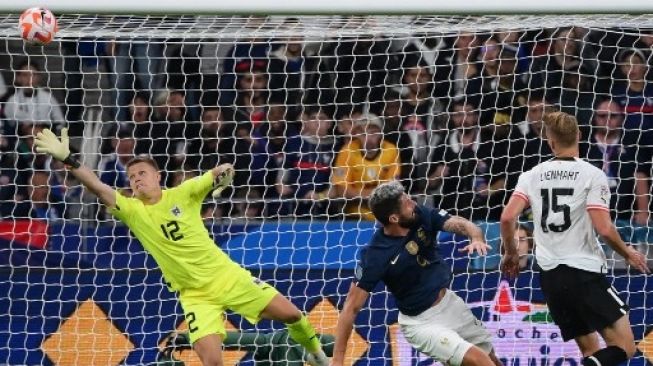 Kylian Mbappe dan Olivier Giroud mencetak masing-masing satu gol untuk Les Bleus dalam pertandingan itu. (AFP)