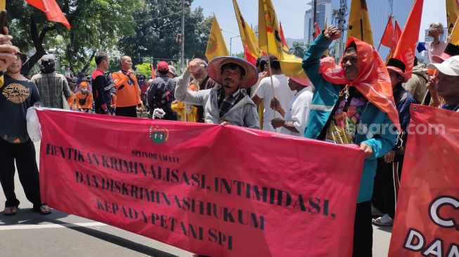 Unjuk Rasa di Patung Kuda, Serikat Petani Singgung Janji Jokowi Redistribusi 9 Juta Hektar yang Minim Realisasi