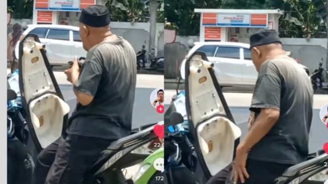 Saking Lamanya Antre BBM! Bapak Pengemudi Motor Ini Malah Asyik Nikmati Bekal Makanan di Pom Bensin