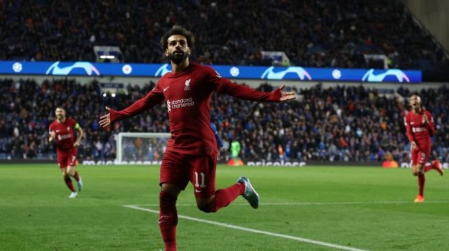 Mohamed Salah melakukan selebrasi setelah mencetak gol keenam Liverpool dalam pertandingan Liga Champions lawan Rangers pada 13 Oktober 2022. ANTARA/Reuters/LEE SMITH