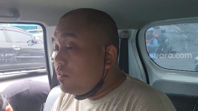 Christian Rudolf Tobing (36), tersangka pembunuh wanita terbungkus plastik di kolong tol Becakayu. (ist)