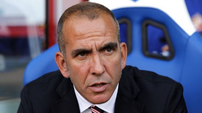 Mantan pemain Juventus, Paolo Di Canio. [IAN KINGTON / AFP]