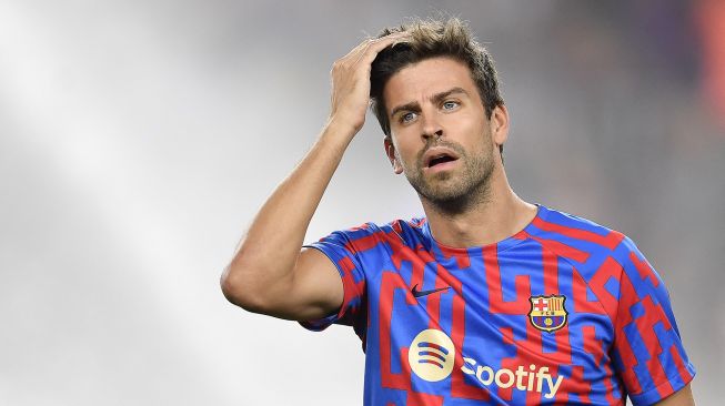 Bek Barcelona Spanyol Gerard Pique pemanasan dimulainya pertandingan sepak bola leg pertama Grup C Liga Champions UEFA antara FC Barcelona dan Viktoria Plzen, di stadion Camp Nou di Barcelona pada 7 September 2022. Pau BARRENA / AFP