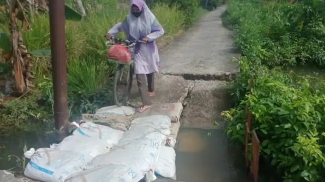 Jalan Utama di Sungai Gampa Putus, Ketua RT Sebut PUPR Banjarmasin Beri Bantuan: Sementara