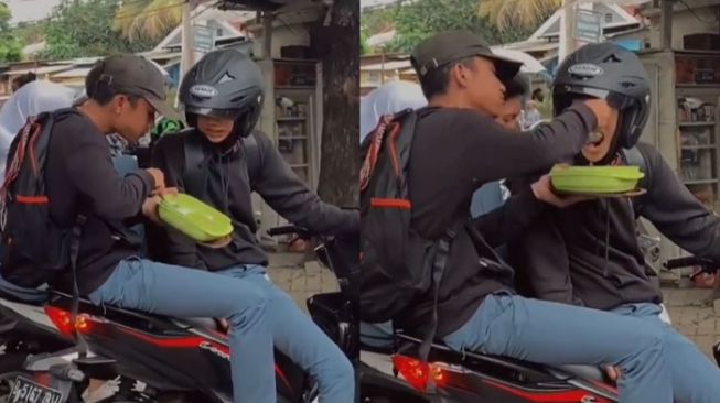 Gemasnya Persahabatan Ini, Cowok Diboncengkan Suapi Temannya yang Bawa Sepeda Motor