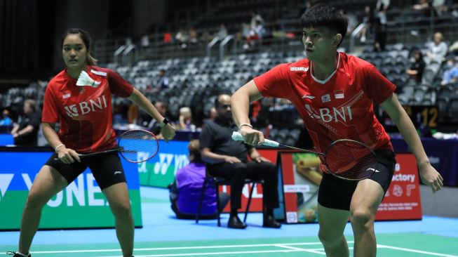 Ganda campuran Indonesia Adnan Maulana/Nita Violina Marwah saat tampil di Australian Open 2022. (dok. PBSI) 